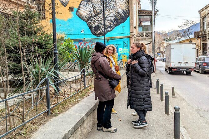 Alternative walking tour New Tiflis and backstreets - Orbeliani Square: presidential architecture plus a flower market pause