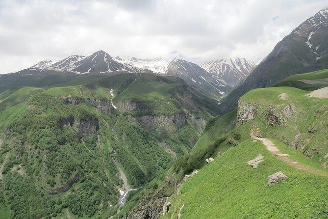 Caucasus mountains full day Private Tour Ananuri-Gudauri-Kazbegi - Ananuri Fortified Castle Ensemble: medieval walls, Saint-George church, and defense logic