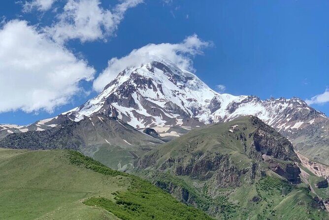 Day tour to mountains Jinvali lake, Ananuri, Kazbegi, Arch friendship - Zhinvali Lake and the Zhinvali Dam: Turquoise Water in the Mountains