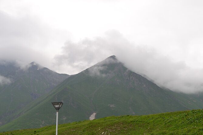 KAZBEGI GUDAURI ANANURI One day group tour From Tbilisi! - Stepantsminda: the crossroads stop before the postcard church