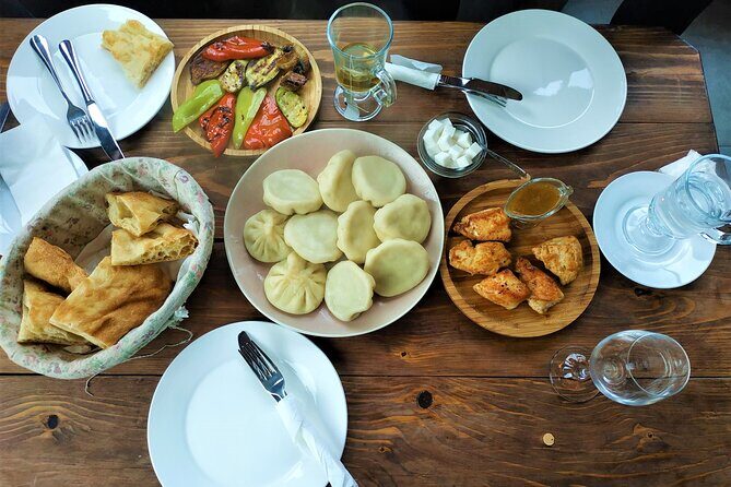 Kazbegi Tour with Gergeti Church, Waterfall Hike & Hidden Gems - Stepantsminda lunch: choose between local family and menu dining