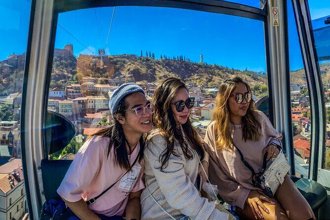 Tbilisi Walking Tour Including Cable Car and Traditional Bakery - Bridge of Peace: the river view that lights up before sunset