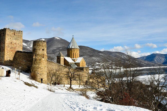 Tour to Kazbegi Ananuri Zhinvali Gudauri Full Day - Zhinvali Reservoir: blue water, quick breaks, and easy photo ops